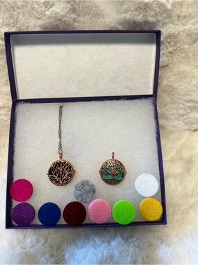 Rose Gold Tree of Life Locket Necklace with 11 essential oils pad inlays .